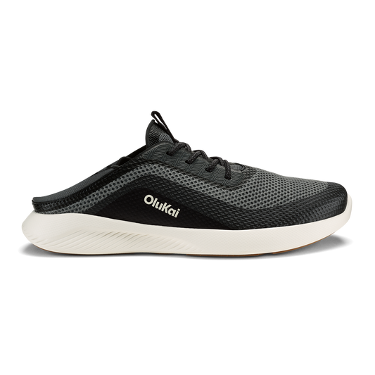 Black mesh athletic shoe with white sole and OluKai branding on the side.