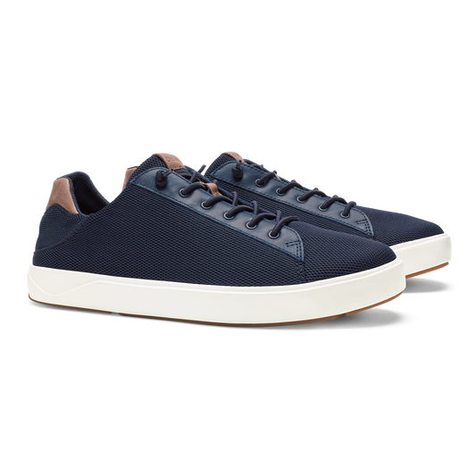 Navy textured lace-up sneakers with brown heel collar and cream rubber sole.