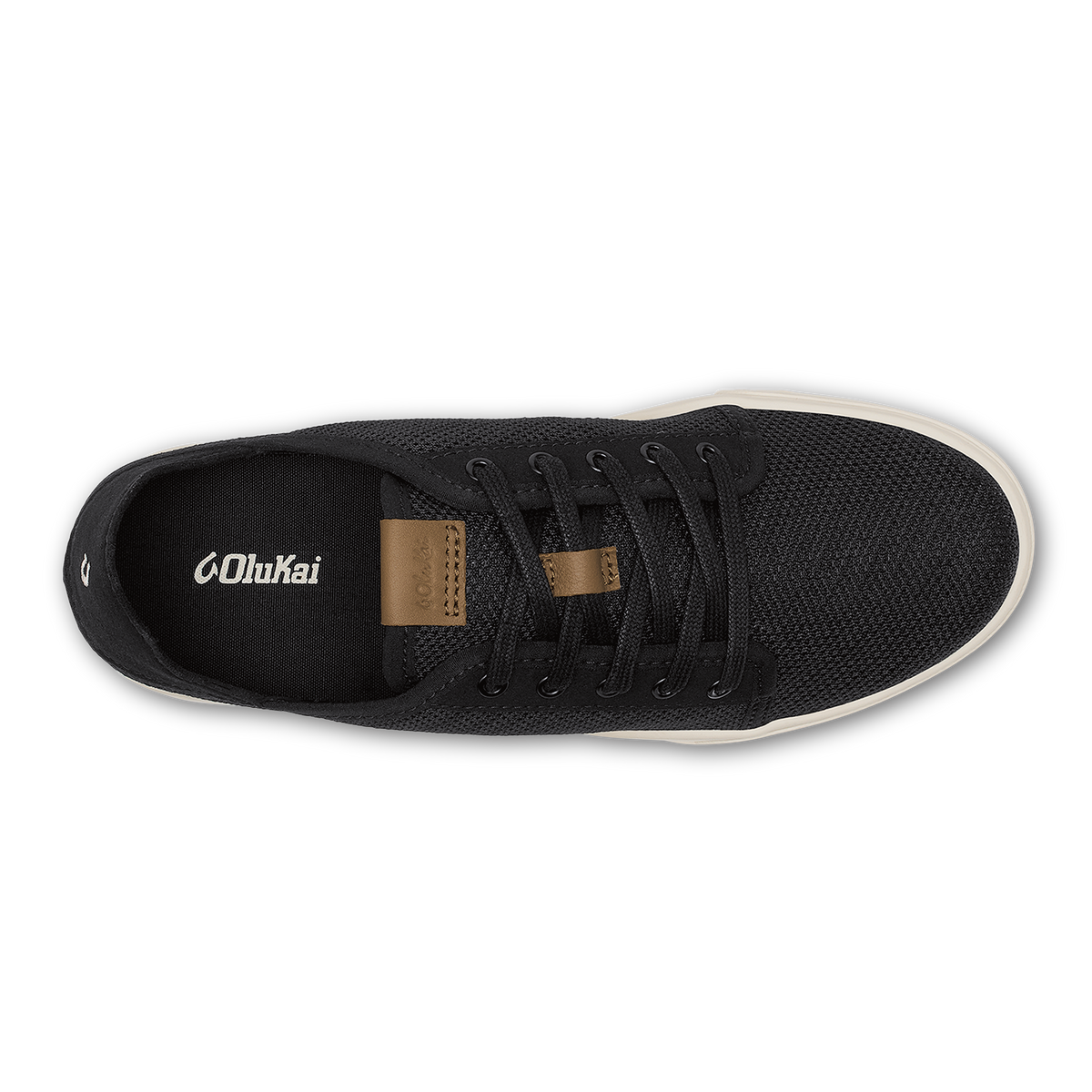 Black canvas sneaker with tan suede heel tab, black laces, and cream rubber sole, shown from above.