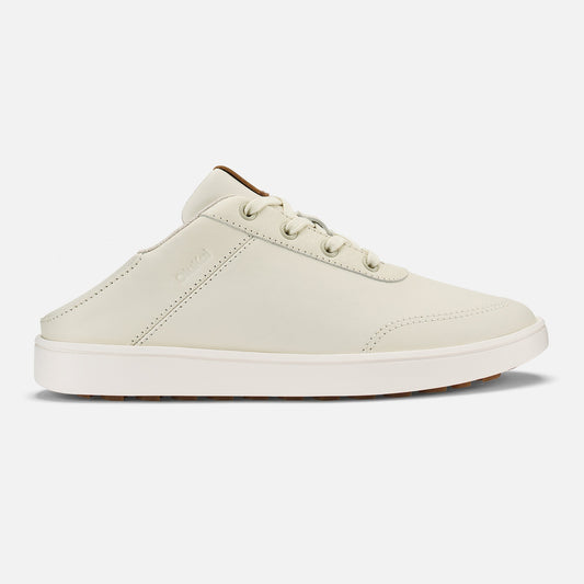 White leather slip-on sneaker with tan heel collar and white rubber sole.