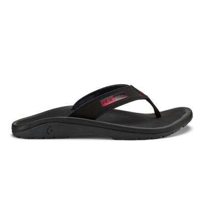 Black thong sandal with cushioned footbed and adjustable fabric strap with HLA branding.