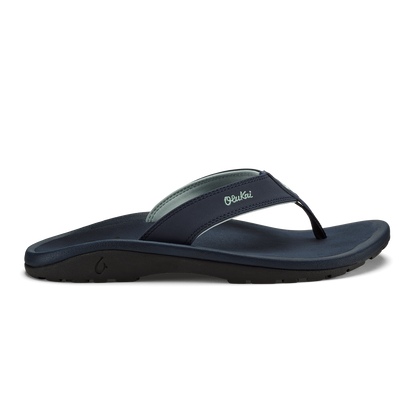 Trench blue flip-flop sandal with thong strap and cushioned sole, shown in side profile.