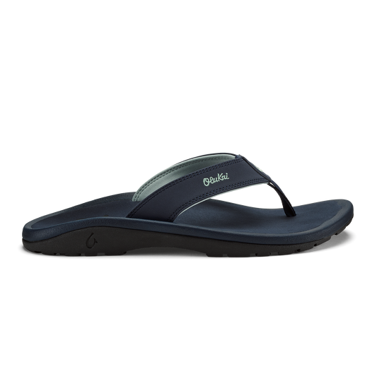 Trench blue flip-flop sandal with thong strap and cushioned sole, shown in side profile.