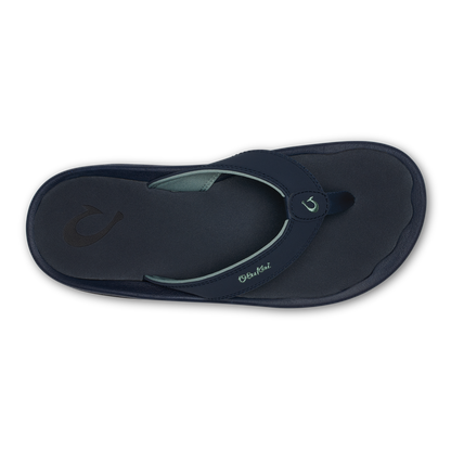 Navy blue thong sandal with padded footbed and toe post, viewed from above.