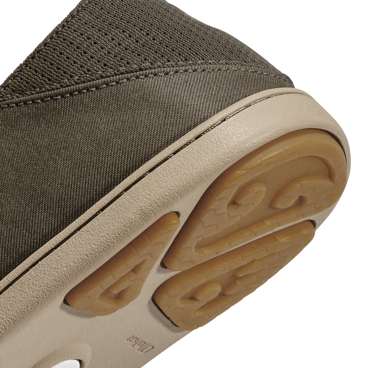 Olive-green canvas upper with cream leather trim and tan rubber sole featuring textured tread pattern.