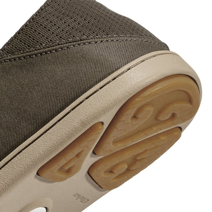 Olive-green canvas upper with cream leather trim and tan rubber sole featuring textured tread pattern.