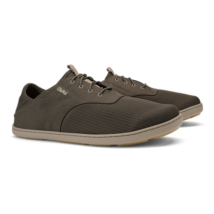 Pair of gray lace-up canvas shoes with tan sole and textured fabric panels.