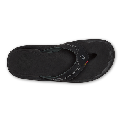 Black thong sandal with textured sole and contrast stitching detail, shown from above.