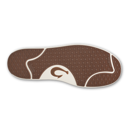 Sole of black Lae'ahi Lauhala sandal with brown textured pattern and cream-colored wave design.