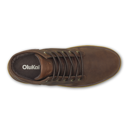 Dark brown leather lace-up boot with Olukai branding and contrast toffee-colored sole, viewed from above.