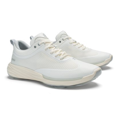 White mesh and leather lace-up running shoes with cream-colored cushioned sole.
