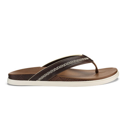 Toffee-colored thong sandal with dark textured upper strap, white stitching detail, and cream-colored sole.