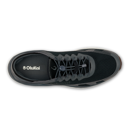 Black OluKai ʻAhi shoe with lace-up closure and padded collar, shown from above.