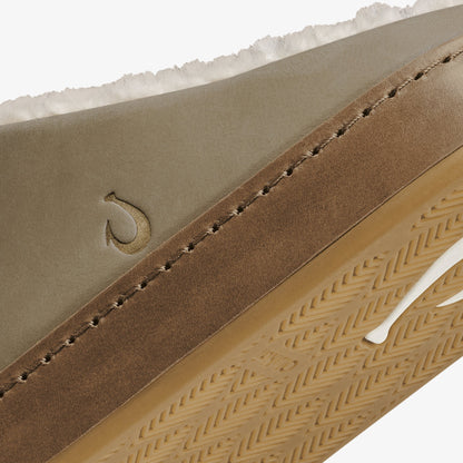 Tan and brown suede upper with stitched details and textured tan rubber sole, showing product logo and herringbone tread patt