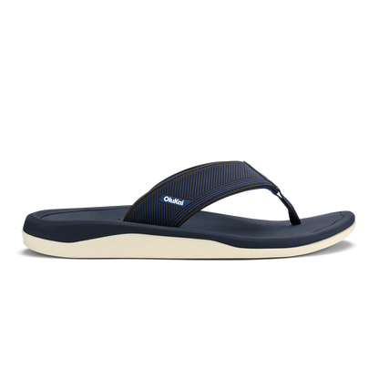 Navy blue thong sandal with ribbed toe strap and cream-colored sole.