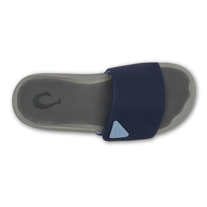 Ulele Slide sandal with blue depth fabric strap and charcoal gray sole, shown from above.