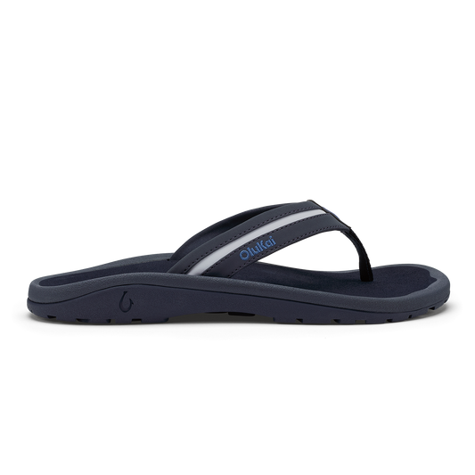 Navy blue sandal with white sole on a white background