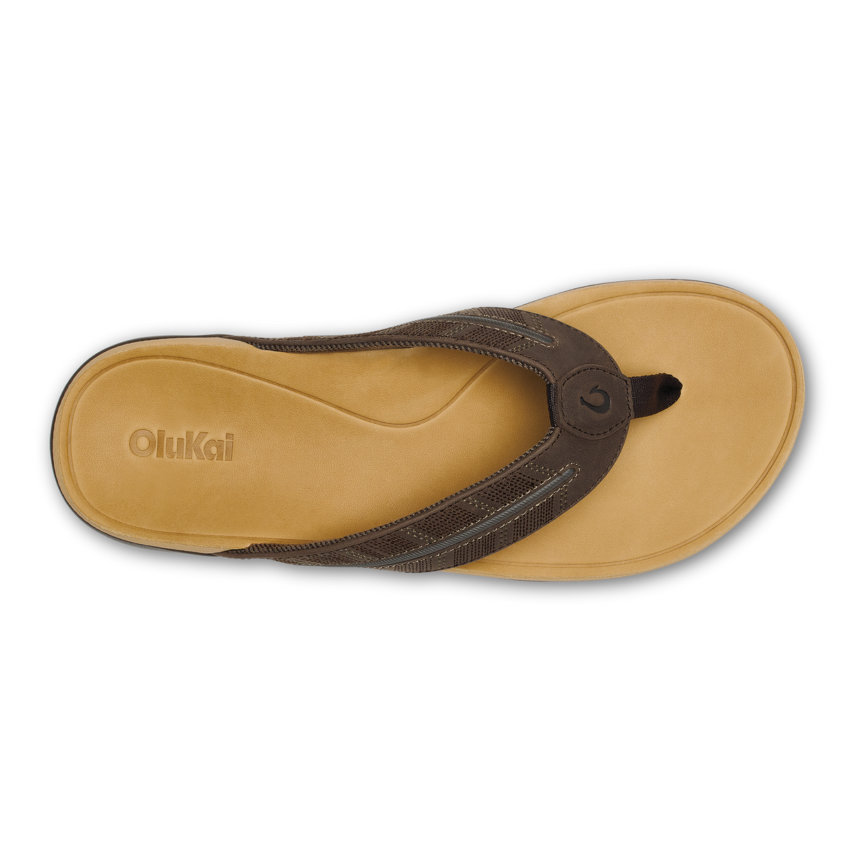 Tan sandal with dark brown straps and circular toe post closure, viewed from above.