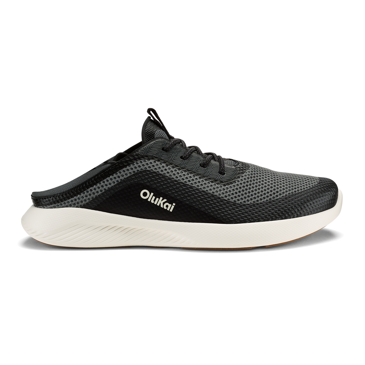 Black mesh athletic shoe with white sole and OluKai branding on the side.