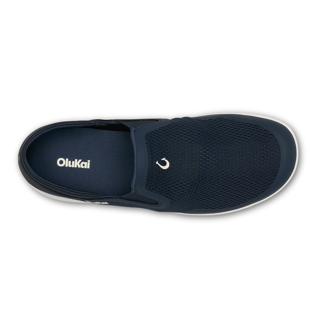Trench blue slip-on shoe with textured mesh upper, white sole, and OluKai branding, shown from above.