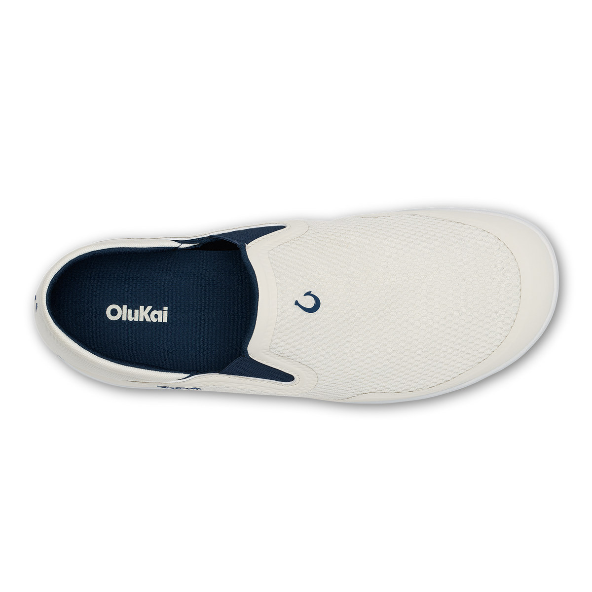 White slip-on sneaker with trench blue heel panel and OluKai branding, shown from above.