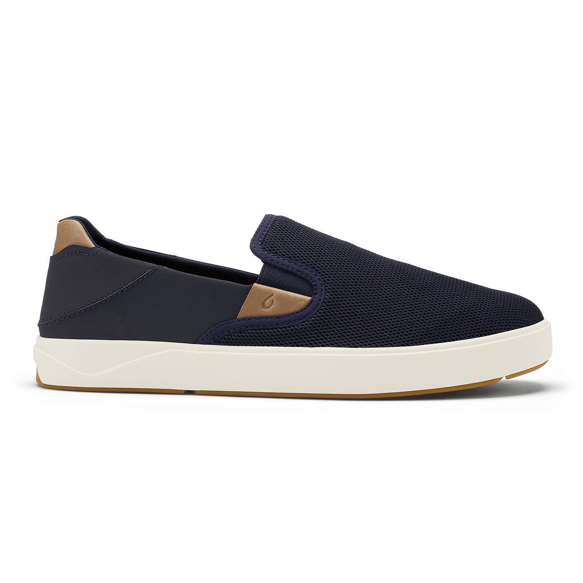 Navy blue slip-on sneaker with tan heel panel and cream rubber sole.