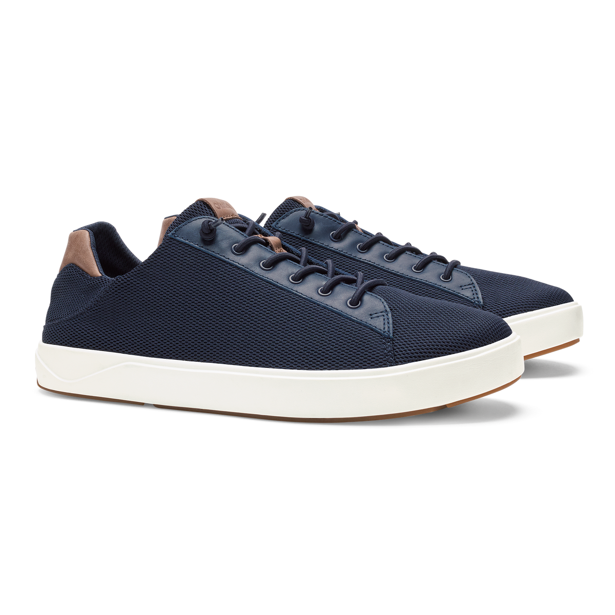 Navy textured lace-up sneakers with brown heel collar and cream rubber sole.