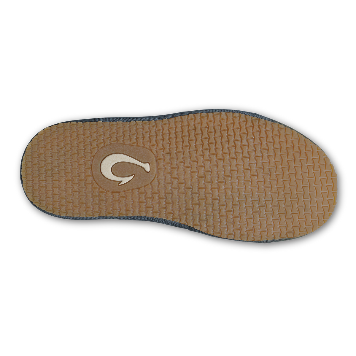 Sole of shoe with tan textured surface, dark shadow edge trim, and curved logo emblem.