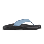 Light blue thong sandal with black sole and strap, featuring stitched detailing.