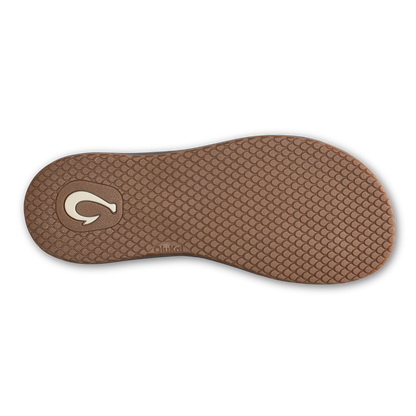 Brown textured sole with white oval logo and brand name visible on bottom surface.