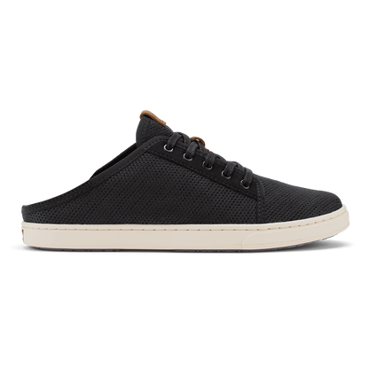 Black knit slip-on shoe with tan lining and cream sole, featuring lace-up front detail.