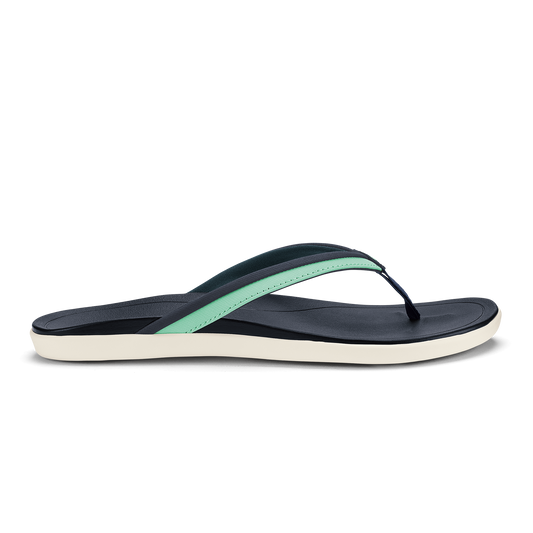 Navy and mint green thong sandal with cream-colored sole.