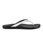 Black flip-flop sandal with bright white thong strap and cushioned footbed.