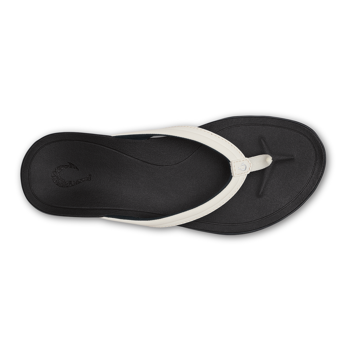 Black thong sandal with bright white strap and black footbed, shown from above.