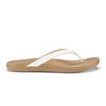 Tan and white flip-flop sandal with curved footbed and thin white strap across the foot.