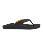 Black flip-flop sandal with yellow and patterned black thong strap and textured sole.