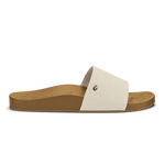 Tan slide sandal with cream textured upper strap and small metal rivet detail.