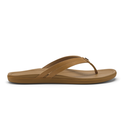 Tan flip-flop sandal with thong strap and cushioned sole, shown from side view.