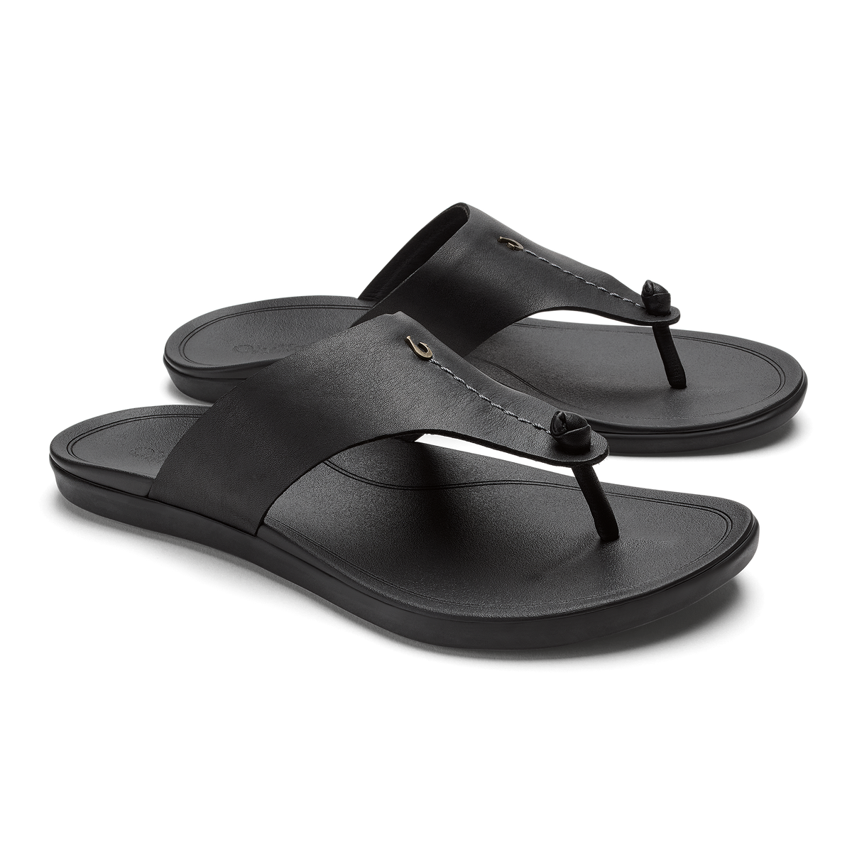 Black thong sandals with cushioned footbeds and decorative knot details on the straps.