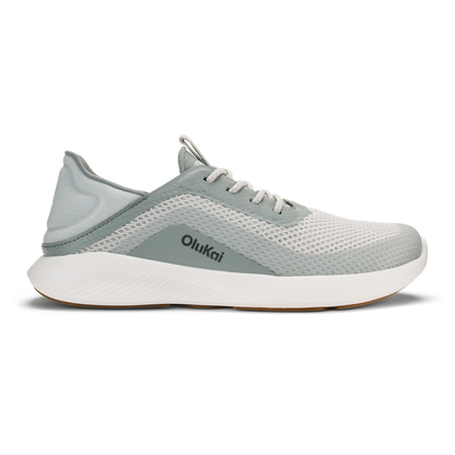 Olukai Kialoa running shoe in sterling gray and white with mesh upper and white cushioned sole.