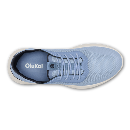 Light blue mesh athletic shoe with white laces and cream-colored sole, shown from above.