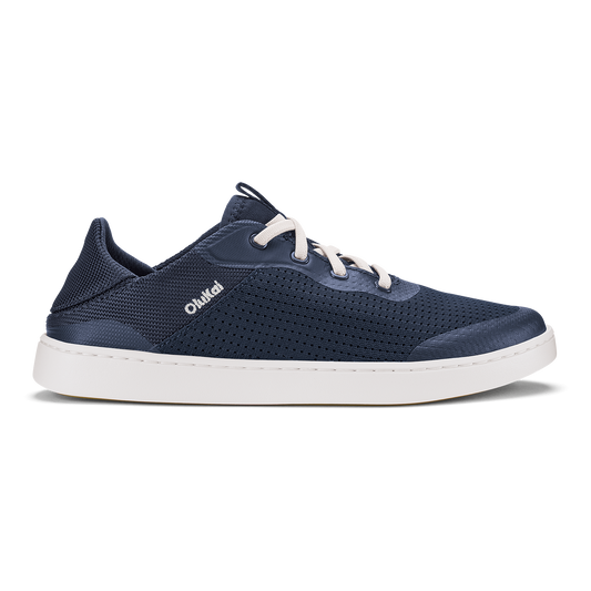 Trench blue perforated sneaker with white laces and white sole, viewed from the side.