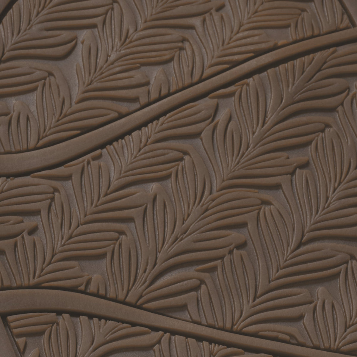 Warm sand-colored sole with leaf-pattern texture and two dark straps across the surface.