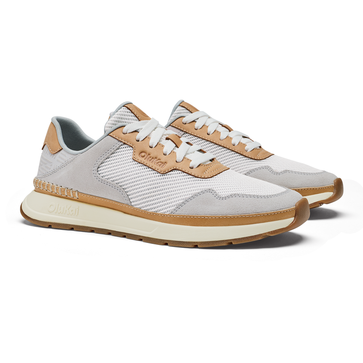 White and tan lace-up sneaker with mesh upper, suede accents, and cream rubber sole.