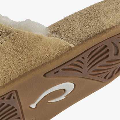 Tan textured straps with brown patterned sole featuring white curved logo detail.