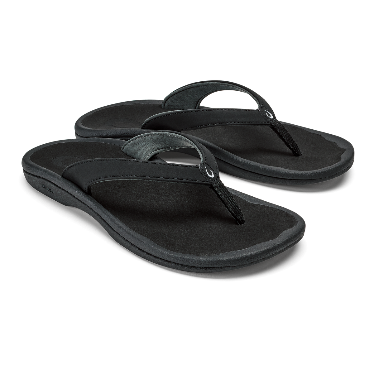Pair of black thong sandals with cushioned soles and dark straps against white background.