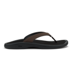 Black flip-flop sandal with dark brown leather thong strap and curved sole.
