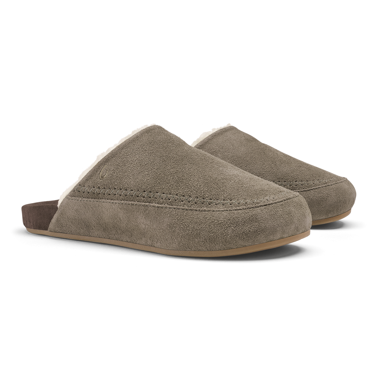 Pair of gray suede slip-on mules with brown heel backs and tan soles.
