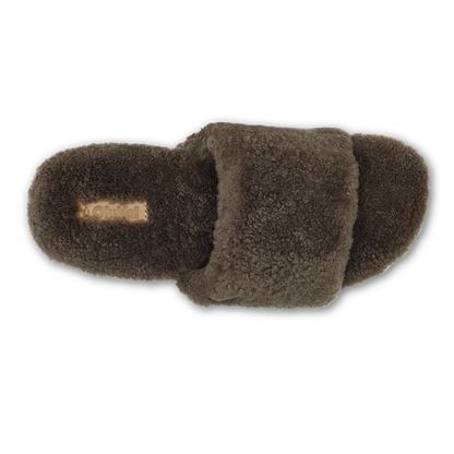 Walnut-colored fleece slippers with rounded toe and heel, shown from above in neutral lighting.