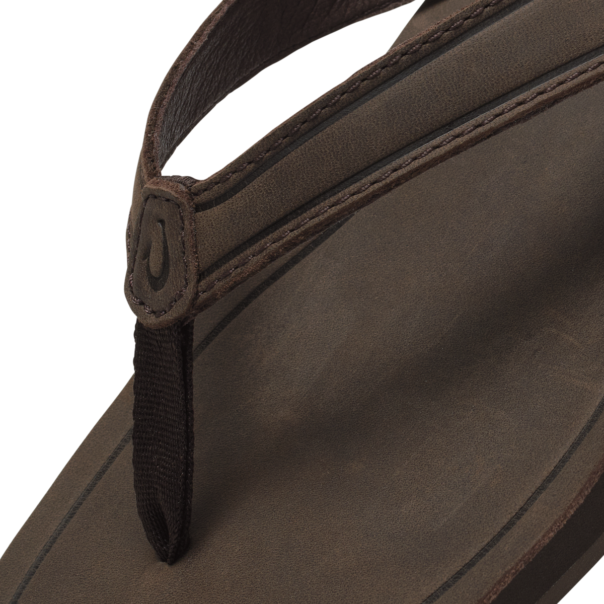Dark brown leather handbag with dual handles and stitched detailing on the body.